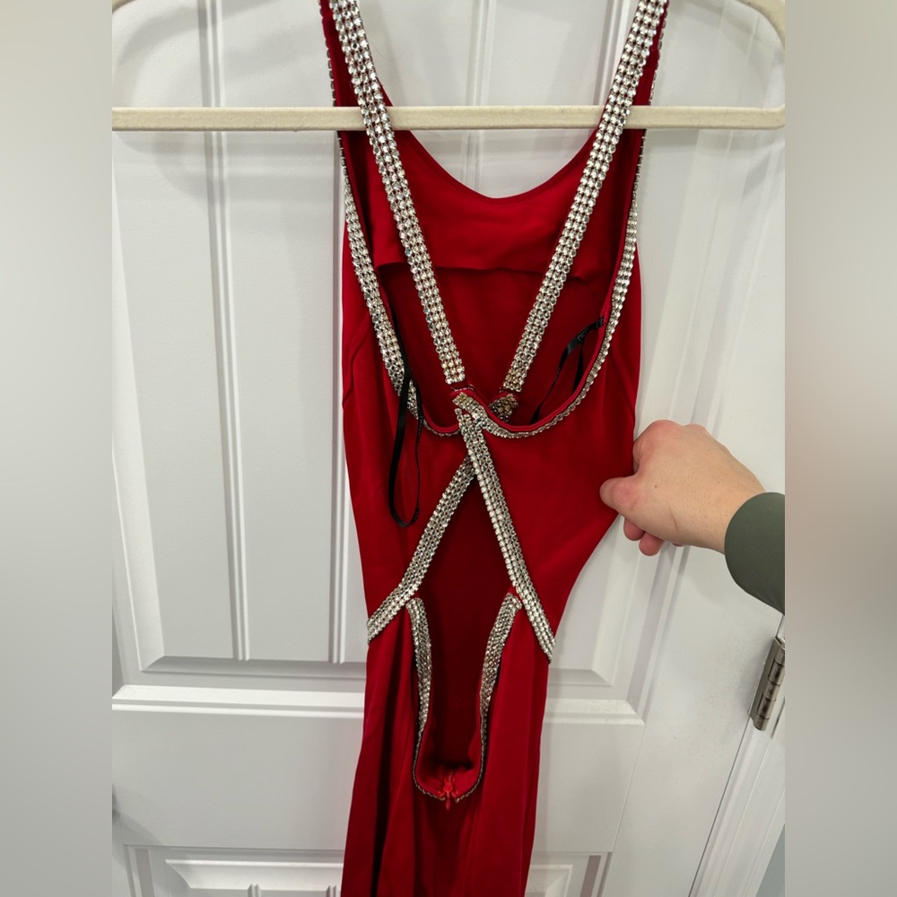 Red prom dress with rhinestones tag says size 3 but it fits like a women's size4